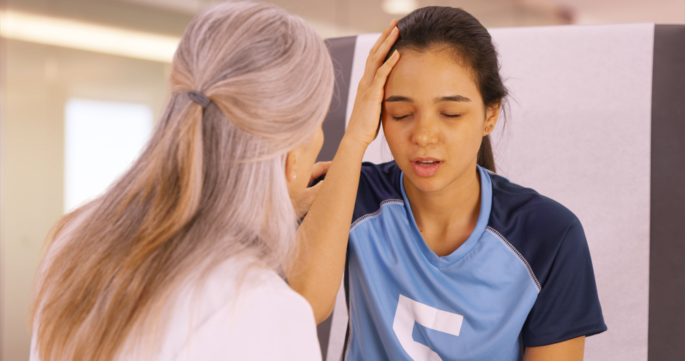 A,Concussed,Soccer,Player,Seeks,Help,At,The,Doctors,Office