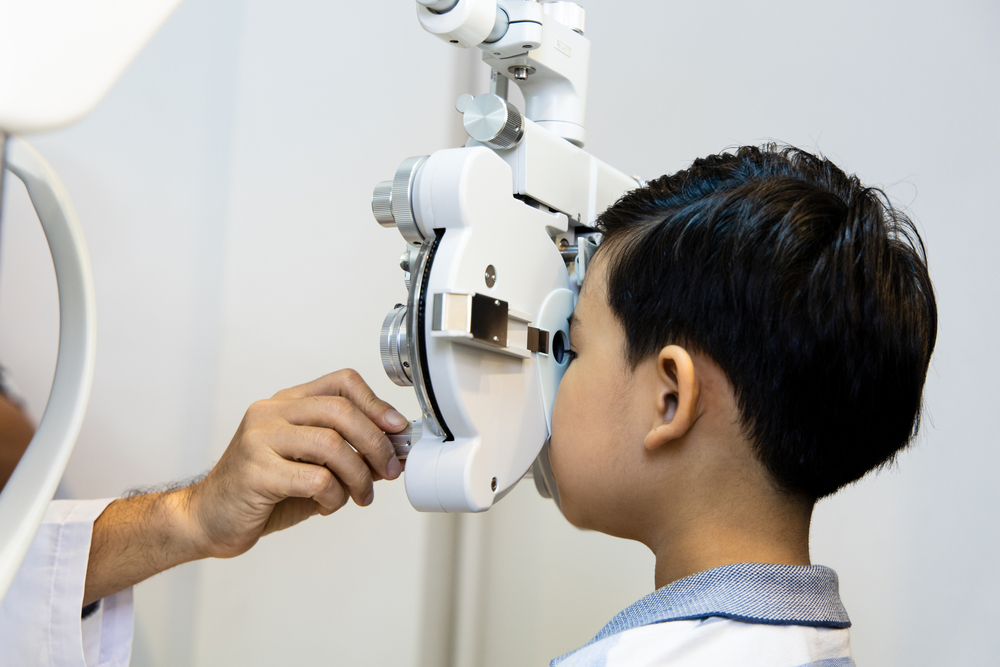 Asian,Optometrists,Are,Examining,Pediatric,Patients',Eyes,With,The,Autorefractor