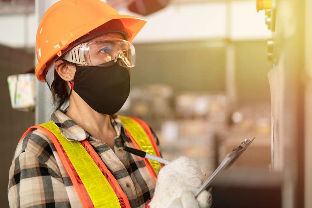 Factory,Woman,Worker,Wearing,Face,Mask,And,Safety,Helmet,With