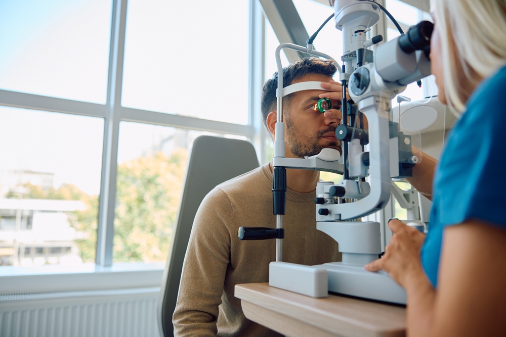Young,Man,Having,Eyesight,Exam,At,Ophthalmology,Clinic.,Copy,Space.