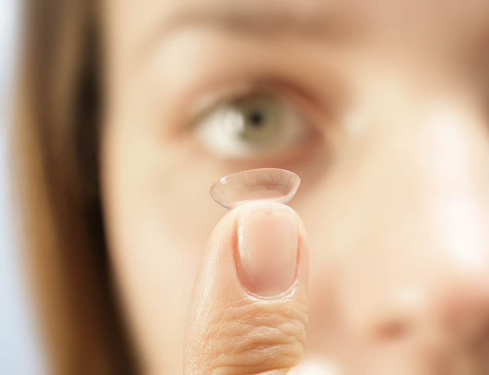 Holding,Up,A,Contact,Lens,-,A,Close,Up,Of