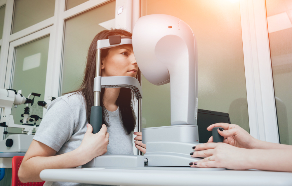 Optometrist,Is,Doing,Corneal,Topography.,Corneal,Exam.,Ophthalmology,Clinic.,Background